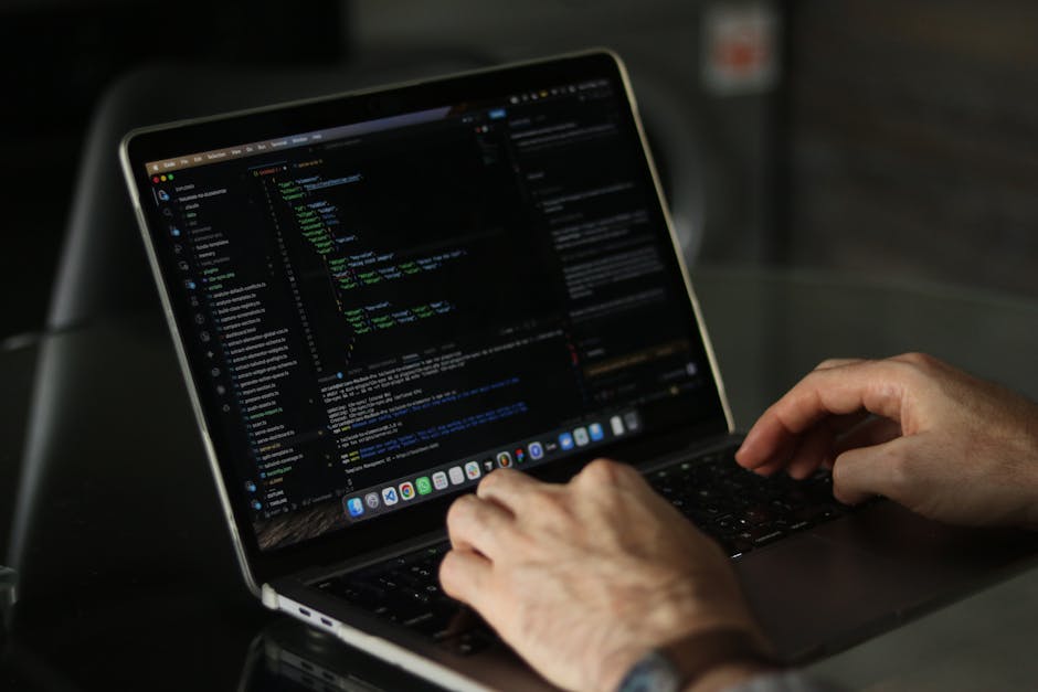 Close-up image of a computer screen displaying lines of code in a dark-themed code editor. The code includes HTML tags, such as 'div', 'a', and 'span', with classes related to carousel controls and na